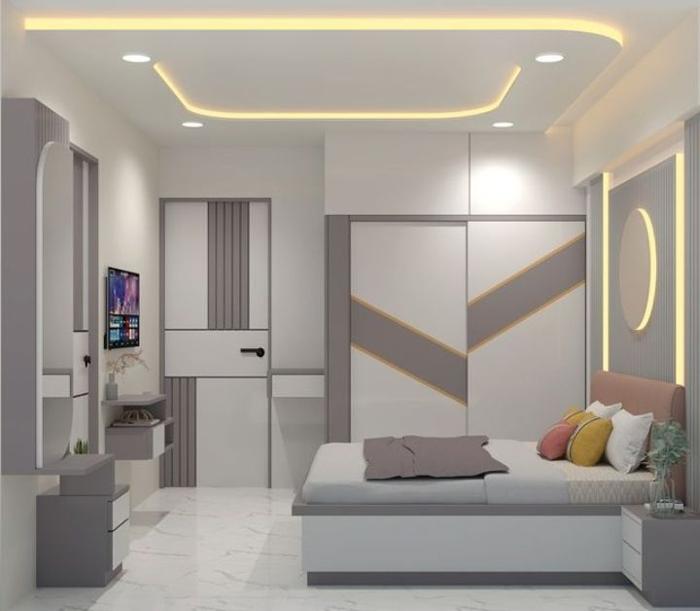 Bedroom interior with soft grey and white walls and cove lighting